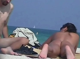 Beach nudist asses sexily waved under the blue sky